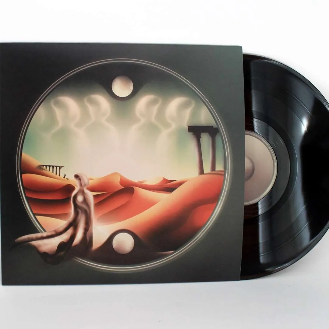 The album sleeve and its vinyl, with the circular desert artwork